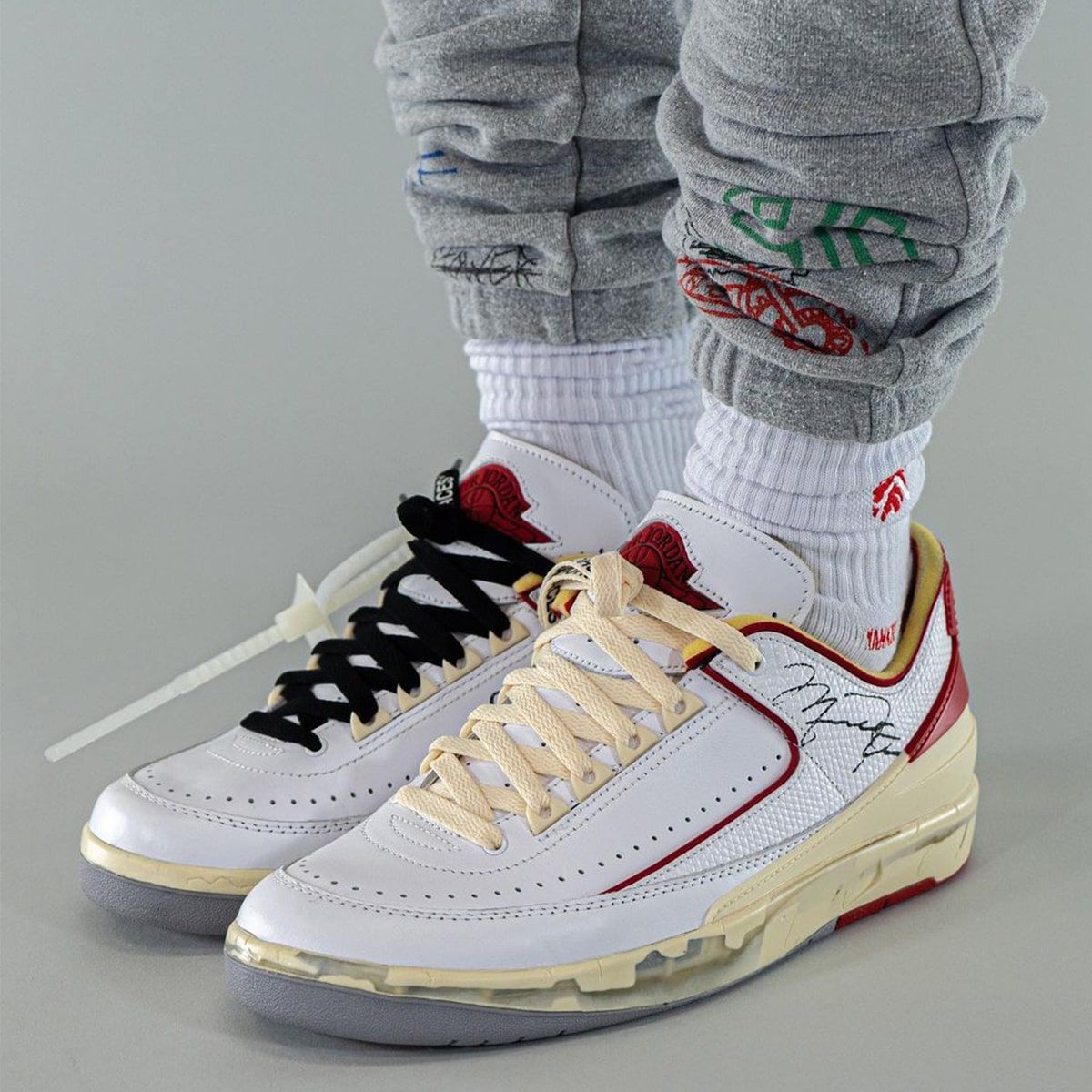 Where to Buy the OFF-WHITE x Air Jordan 2 Low “White/Varsity Red ...