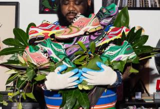 Jae Tips holding the four pairs of his Saucony ProGrid Triumph 4 "Flowers Grow Uptown" collaboration.