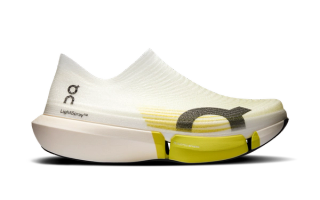On LightSpray Cloudboom Strike 2 marathon racer in a "White/Yellow" color scheme.