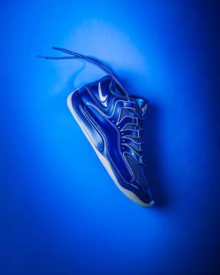 Kevin Durant's Nike KD 18 in a blue color scheme exclusively for the Team Durant EYBL team.
