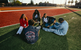 Levi's® x U.S. Soccer Fan Collection, which includes denim and trucker jackets, baggy shorts, and graphic t-shirt. Photo via Levi's®.