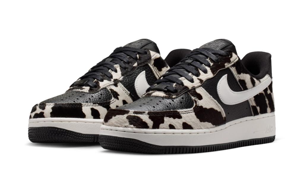 Nike Air Force 1 featuring bold black and white cow print pattern across leather upper