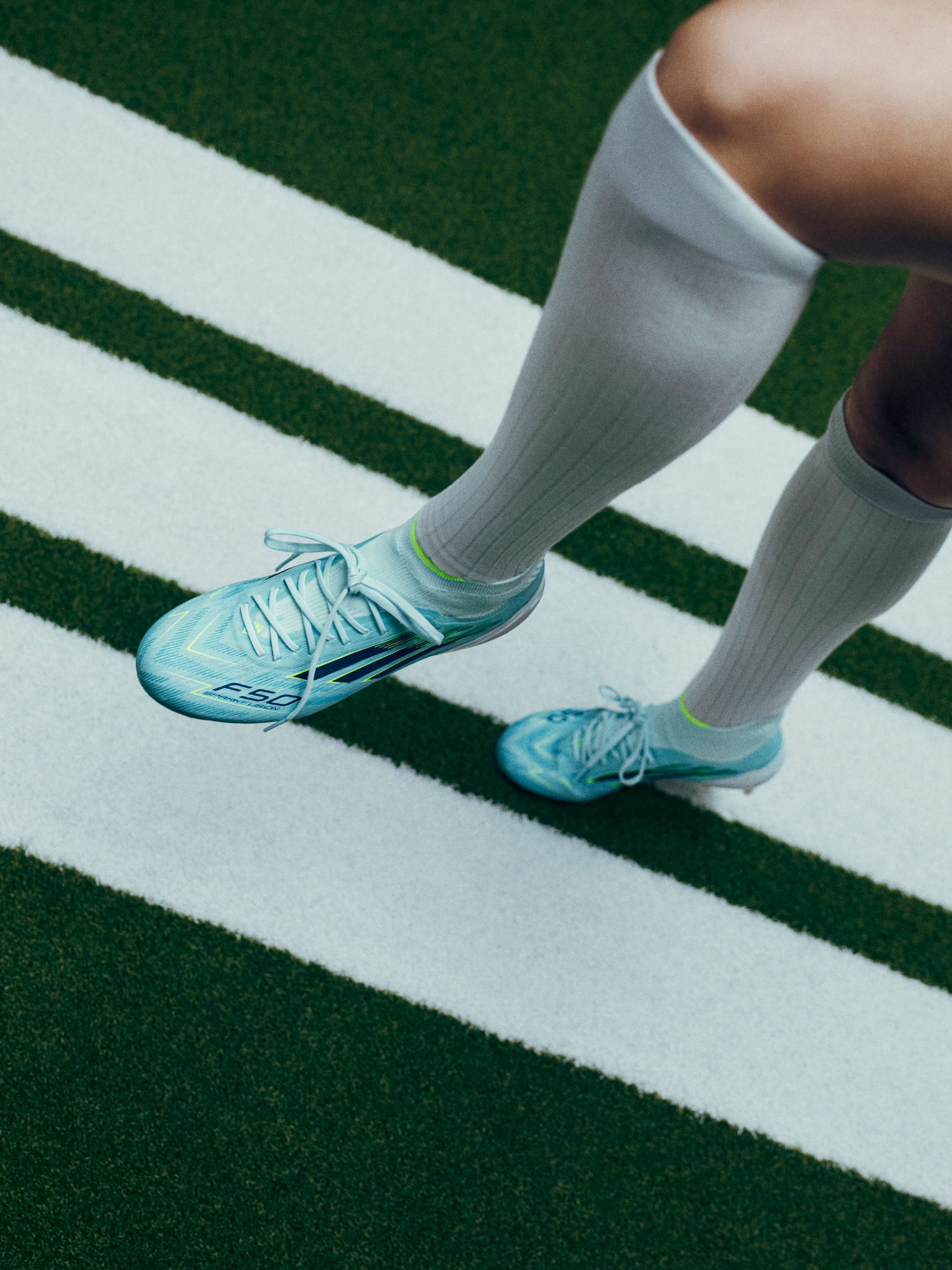 Chloe Kelly join adidas as F50 SPARKFUSION footballer. Photo via adidas.