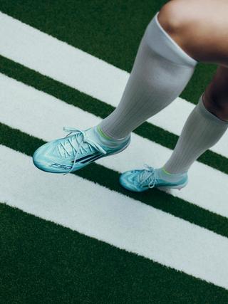 Chloe Kelly join adidas as F50 SPARKFUSION footballer. Photo via adidas.
