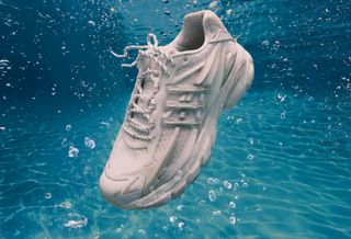 Campaign imagery for Pharrell Williams' VIRGINIA Adistar Jellyfish adidas collaboration in a "Triple White" color scheme.