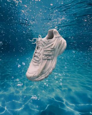 Campaign imagery for Pharrell Williams' VIRGINIA Adistar Jellyfish adidas collaboration in a "Triple White" color scheme.