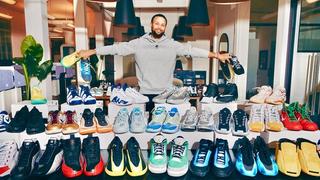 Stephen Curry in front of his Sneaker Free Agency Collection, which will be auctioned off via Sotheby's.