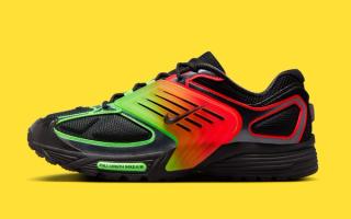 Lateral angle of Nike's Pegasus Wave in a "Black/Bright Crimson/Green Strike" color scheme.