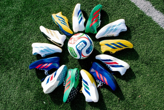 Football federation-inspired adidas Adizero Evo SL pairs. Photo via @heartbreak.run on Instagram.