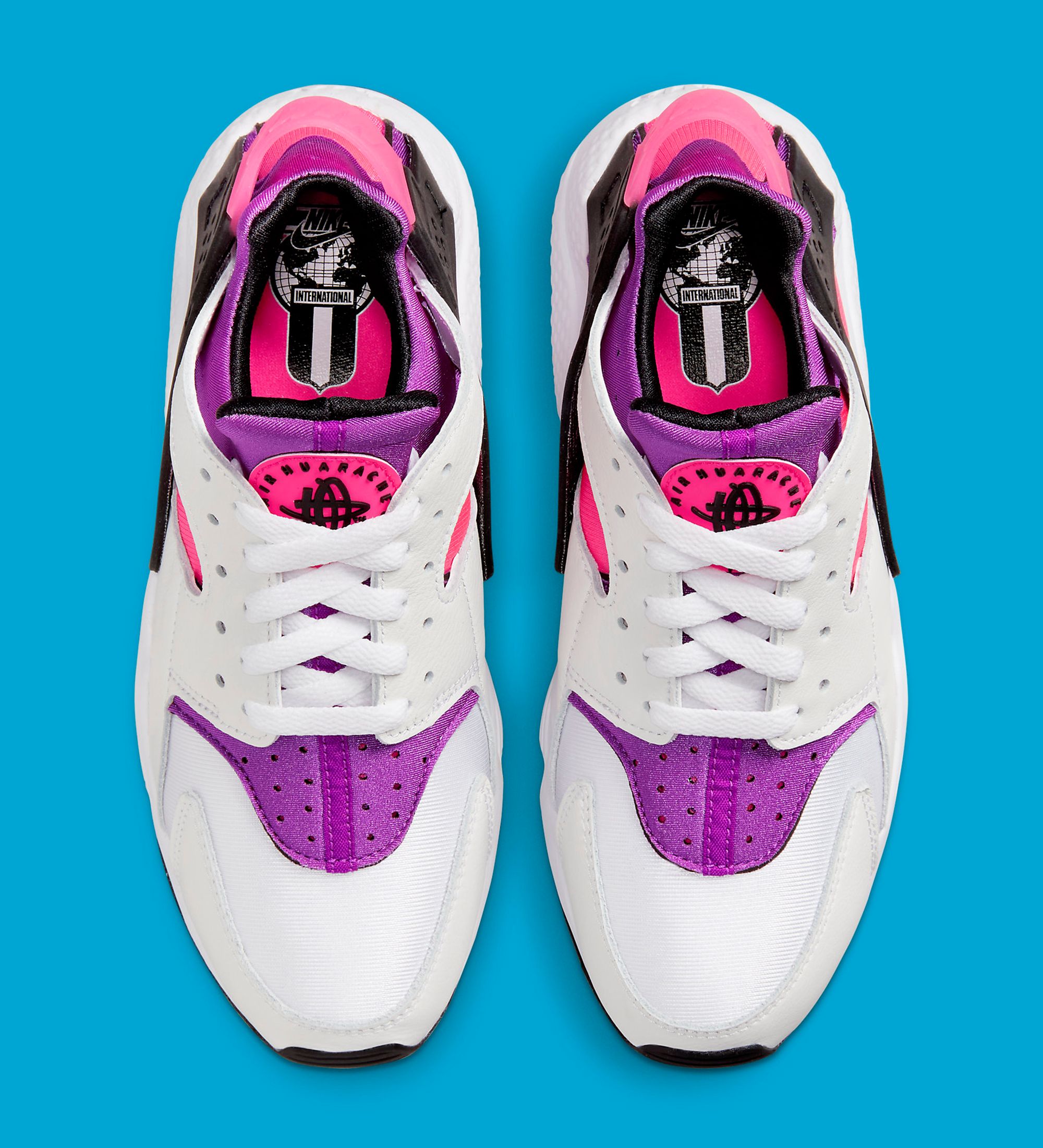 Nike air huarache pink hotsell and purple