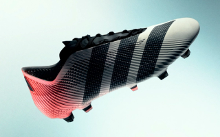 adidas 3D-Printed Football boots in a red-and-grey color scheme.