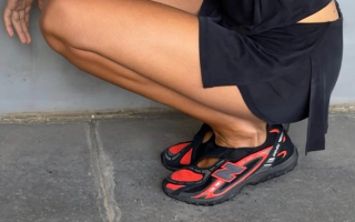 Close-up of Peachy Den model wearing an unreleased, Velcro®-assisted New Balance 204V Mary Jane thin-soled sneaker.