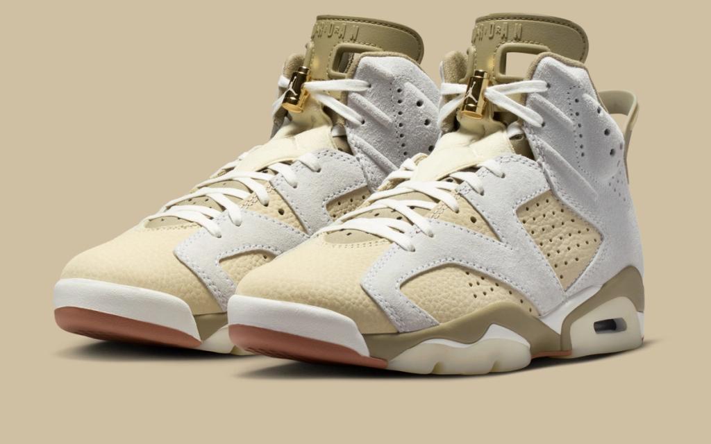 Women's Air Jordan 6 in Sail and Neutral Olive colorway, showing profile view of the iconic silhouette with earth-tone palette