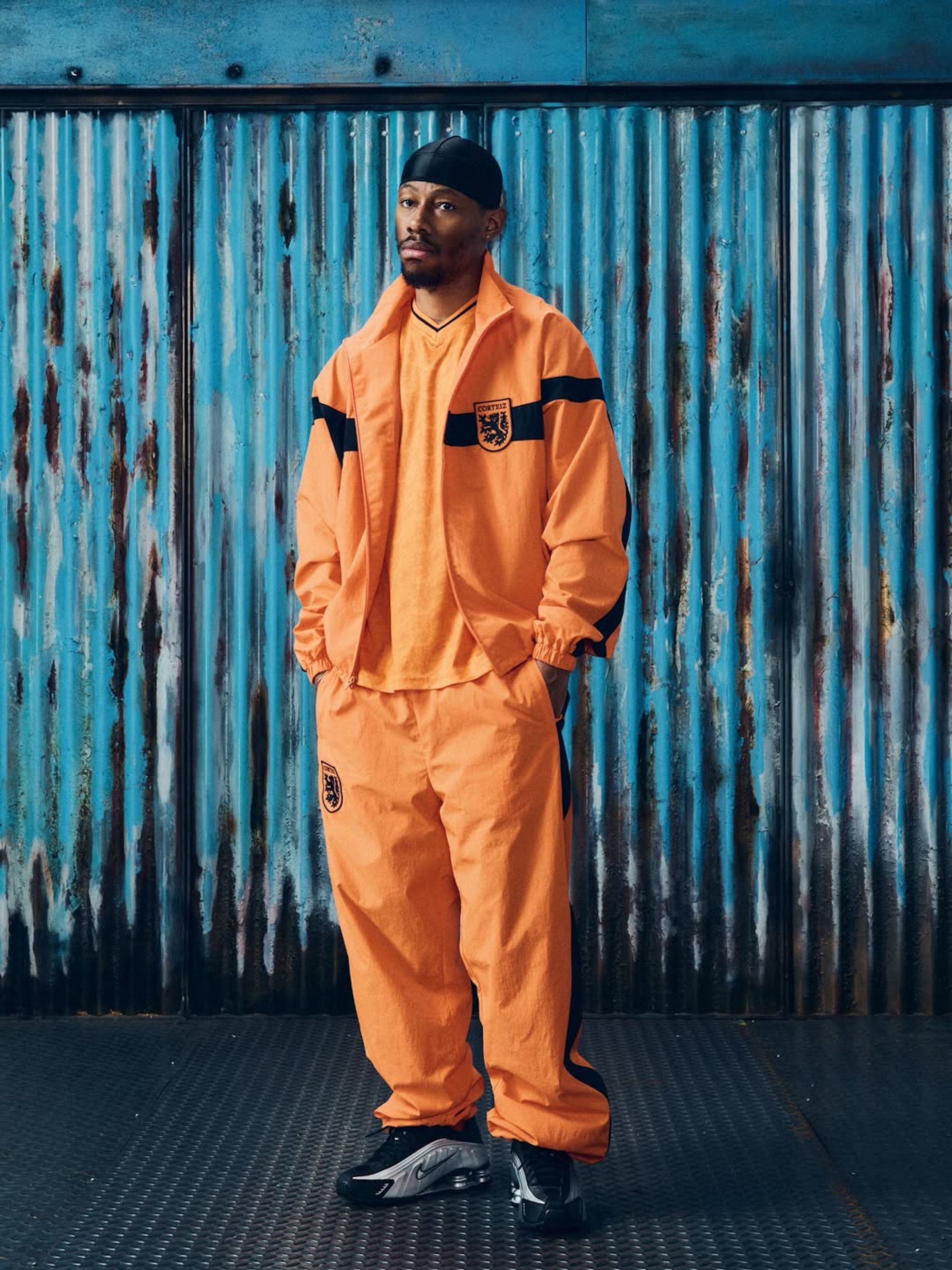 The Netherlands-inspired tracksuit & jersey combinations by Corteiz. Photo via Corteiz.