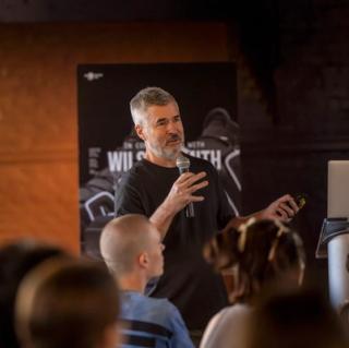 Tate Kuerbis speaking at SCAD SNKR Culture Week 2025.