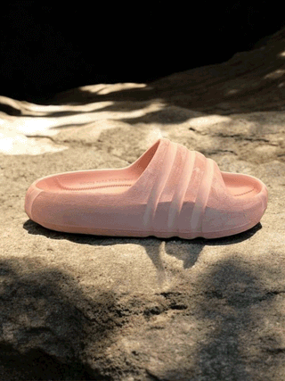 Bad Bunny x adidas Stone Slide. Photos via @hypedsolutions on Instagram.