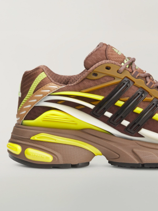 Pharrell's (adidas) VIRGINIA Adistar Jellyfish in a "Auburn/Timber/Yellow" (brown/yellow) color scheme.
