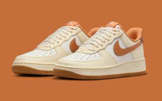 Women's Nike Air Force 1 '07 in a "Coconut Milk/Sail/Celestial Gold/Metallic Copper" color scheme.
