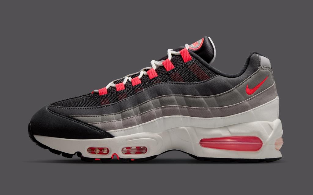 Nike Air Max 95 in Reverse Solar Red colorway, showcasing the classic silhouette's layered construction and updated color blocking
