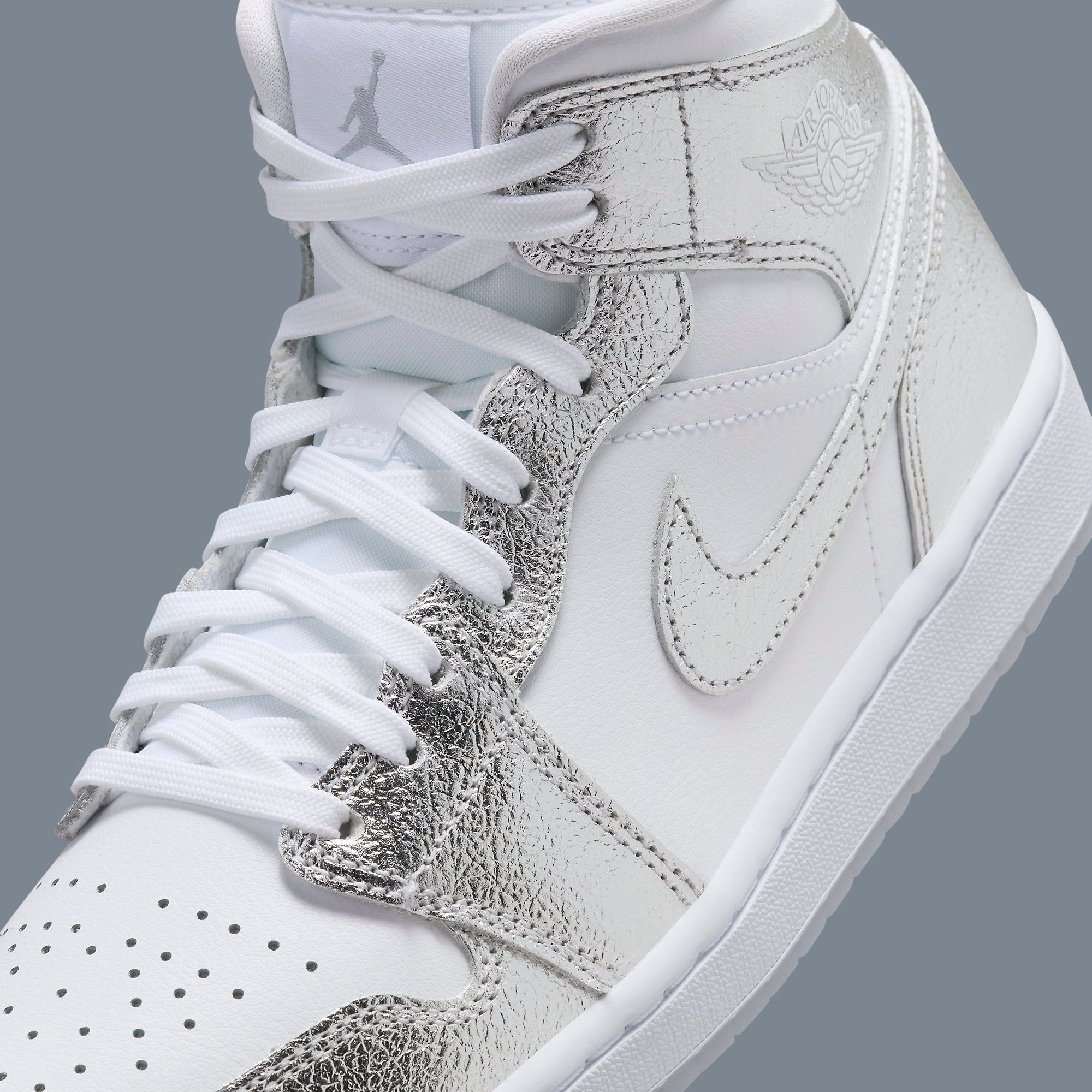 This Air Jordan 1 Mid Comes Covered in Crinkled Chrome | House of Heat°