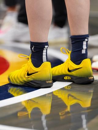 Caitlin Clark wearing Iowa Hawkeyes-inspired Nike Caitlin 1. Photo via Indiana Fever.