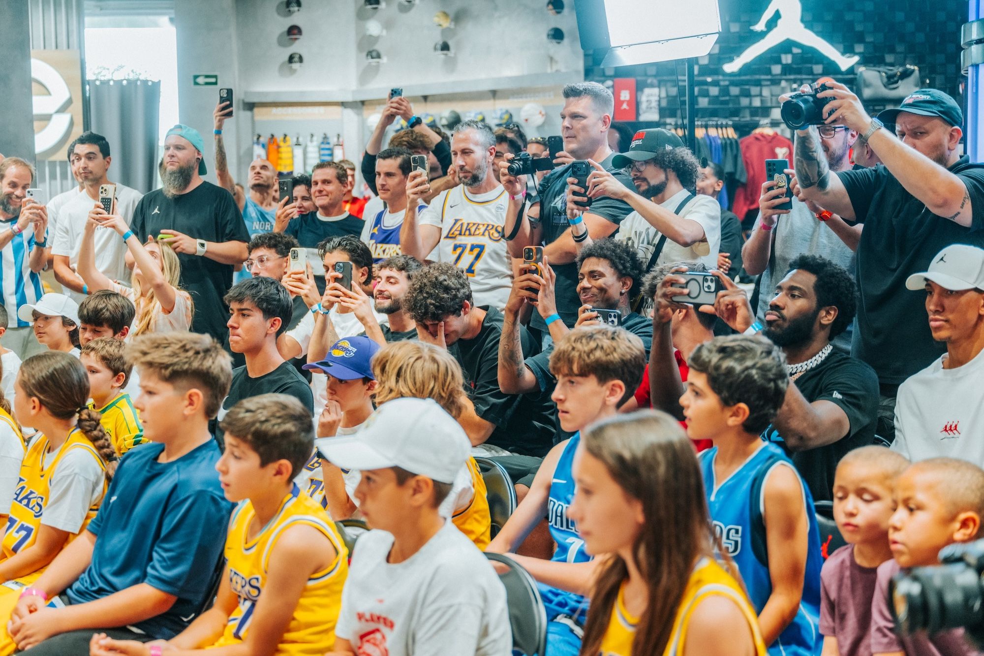 Luka Dončić stops by at Basketball Emotion in Madrid. Photo via Jordan Brand.