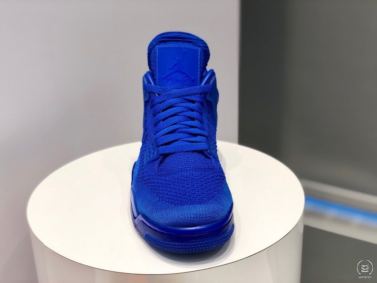 Air jordan 4 hot sale retro flyknit blue