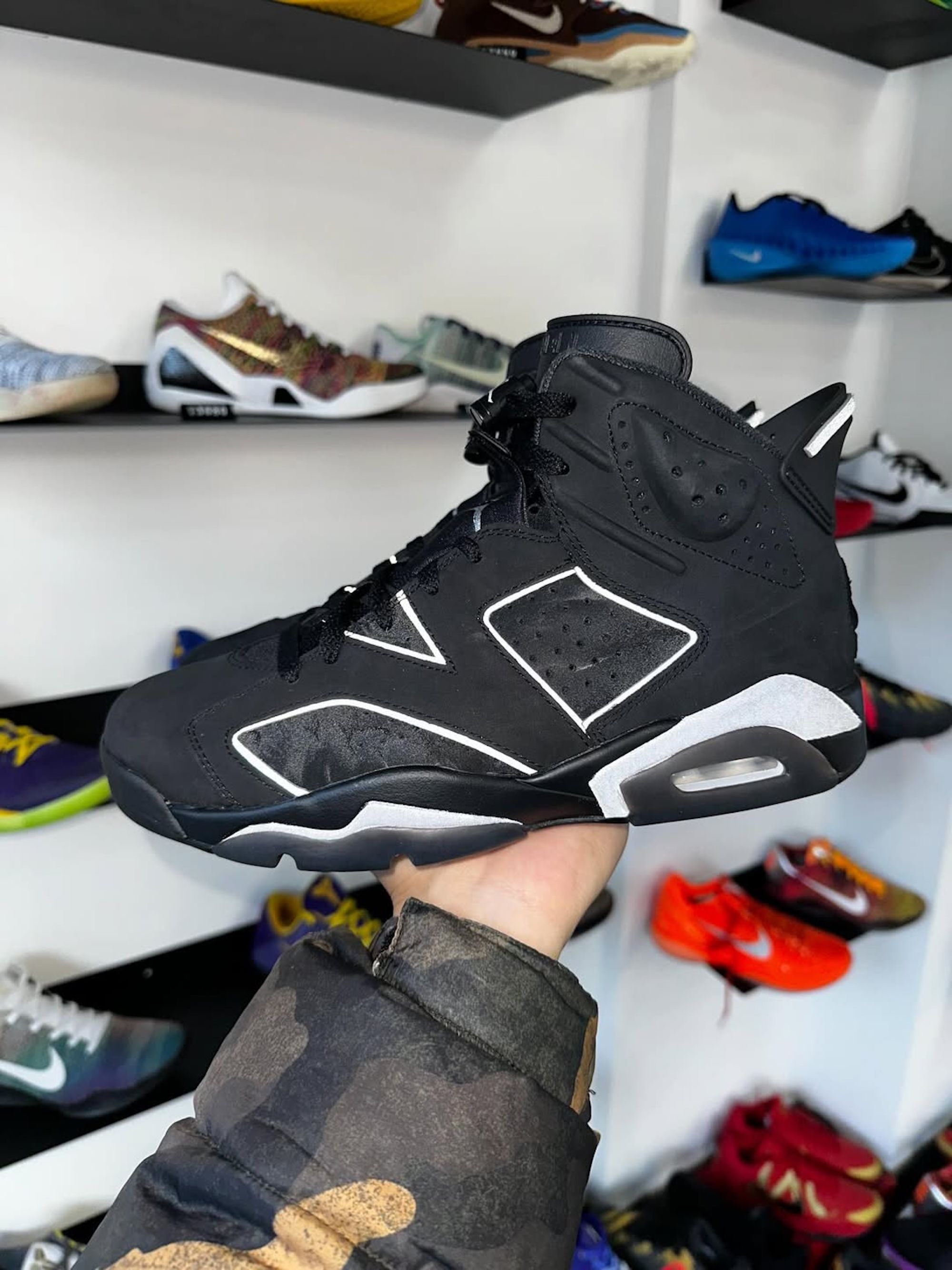 In-hand look at the Air Jordan 6 "Cap & Gown" in Men's sizing.