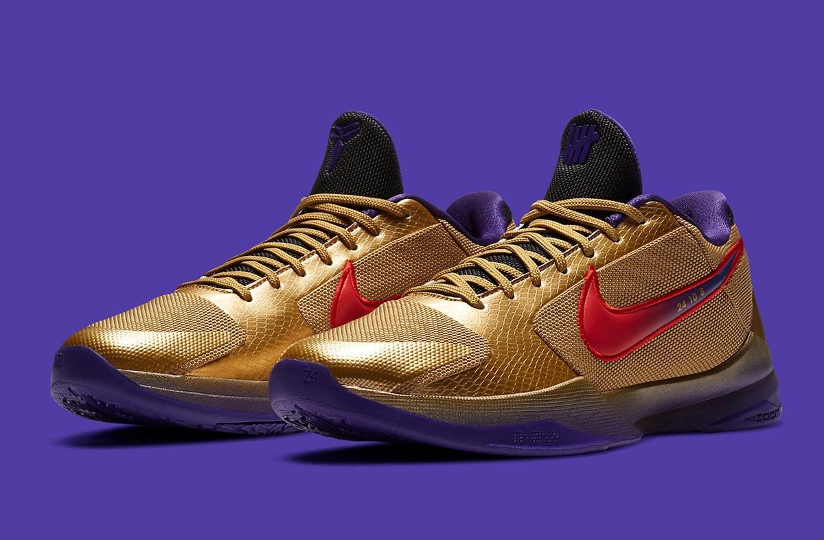 Nike hotsell undefeated gold