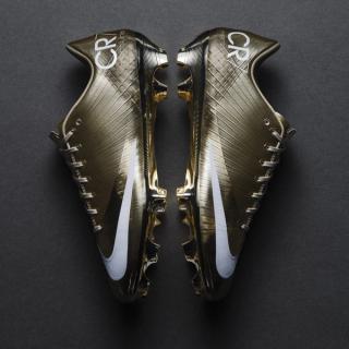 Nike Mercurial Superfly 1 RGN (Regen) in a "Metallic Gold Star/White" color scheme.
