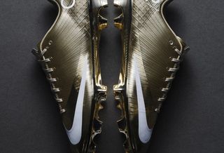 Golden pair of the Nike Mercurial Superfly 1 RGN, celebrating Cristiano Ronaldo's sixth appearance in the World Cup™.