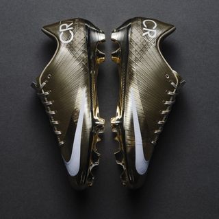 Golden pair of the Nike Mercurial Superfly 1 RGN, celebrating Cristiano Ronaldo's sixth appearance in the World Cup™.