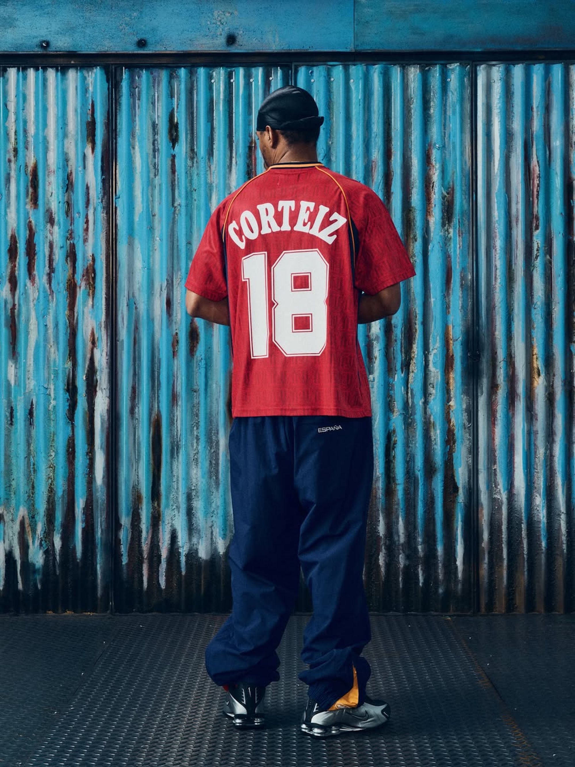 Spain-inspired tracksuit & jersey combinations by Corteiz. Photo via Corteiz.
