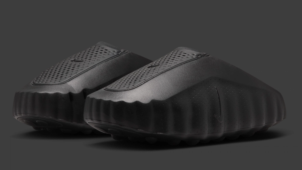 Nike Mind 001 in triple-black colorway, full side profile view
