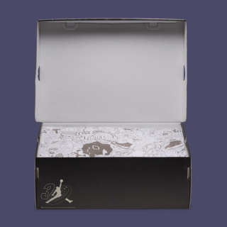 Men's Space Jam x Air Jordan 1 Mid "Black/Varsity Blue" Shoe Box (SKU: IX6374-001). Photo via Nike.