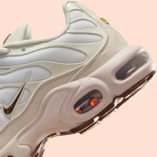 Heel close-up of Nike's Air Max Plus sneaker in a "Light Orewood Brown" color scheme.