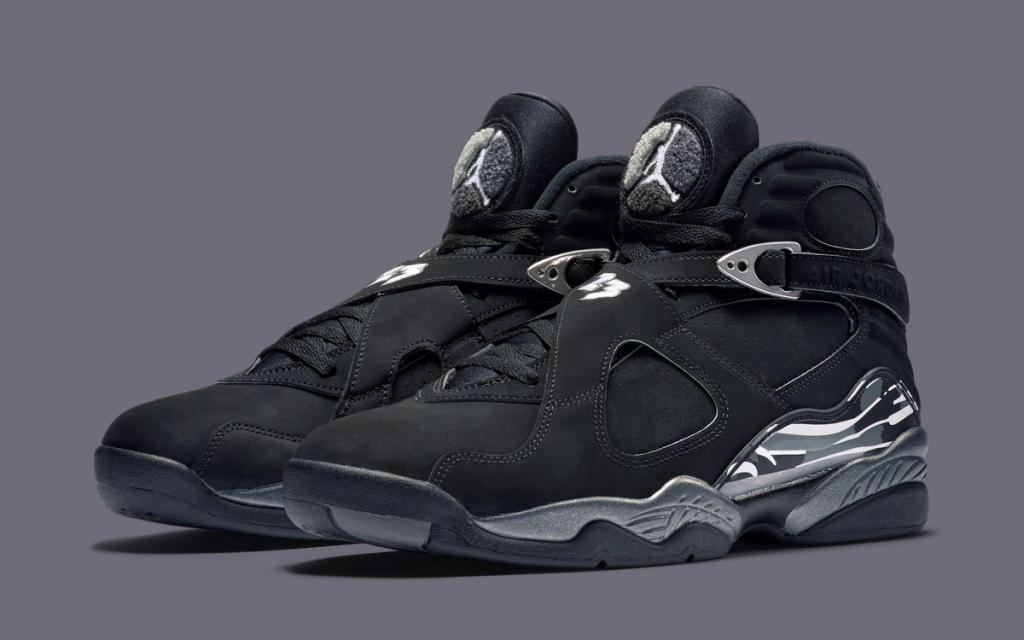Air Jordan 8 Chrome metallic retro sneaker, side profile view showing reflective upper and iconic Air Jordan 8 silhouette