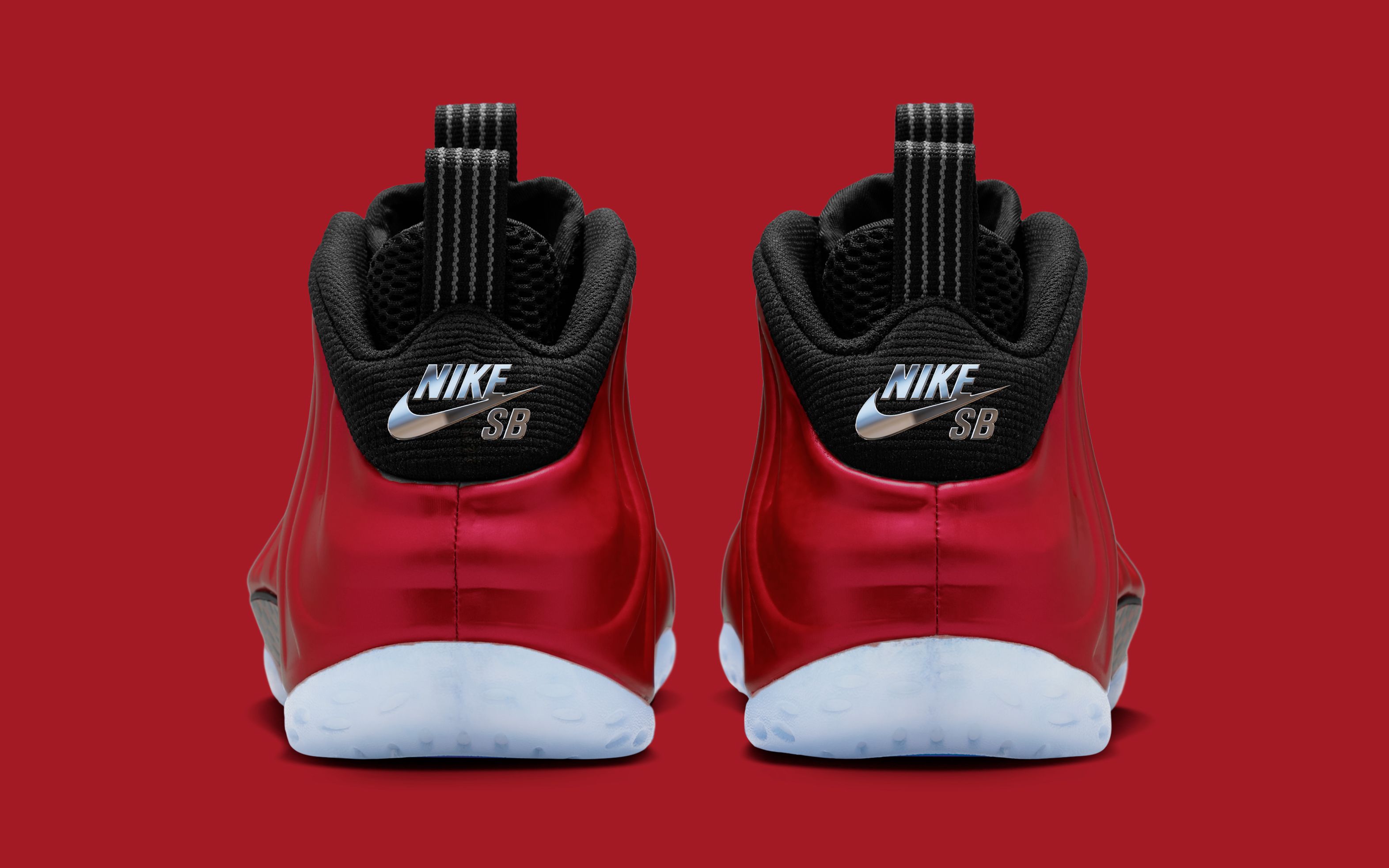 Speculative mock-up of the Nike SB Air Foamposite One in a "Team Red/Black" color scheme, expected to release Spring 2027.