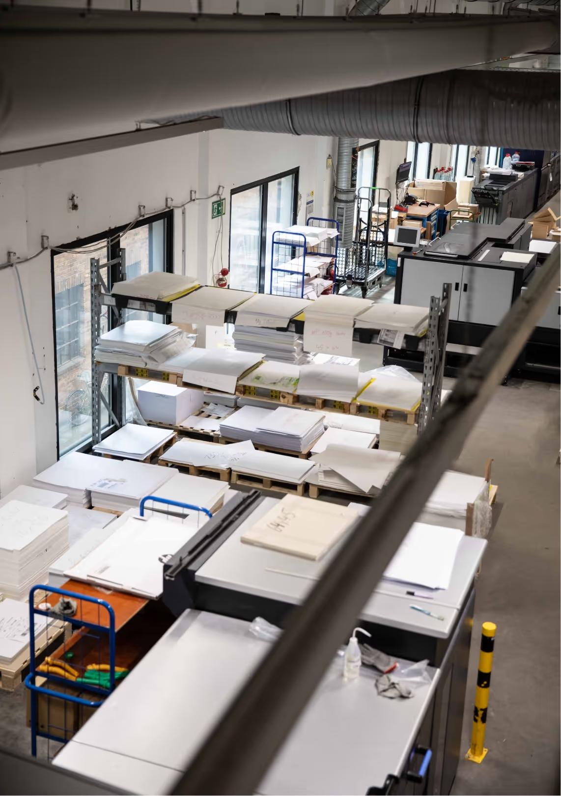 Gedruckte Materialien aus der Fertigung bei Druckwerk Berlin