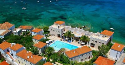 Nissia Traditional Residences pool and gardens on the Kounoupitsa seafront, Spetses