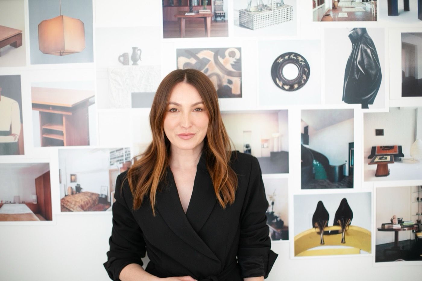 Elizabeth in front of a wall of design references