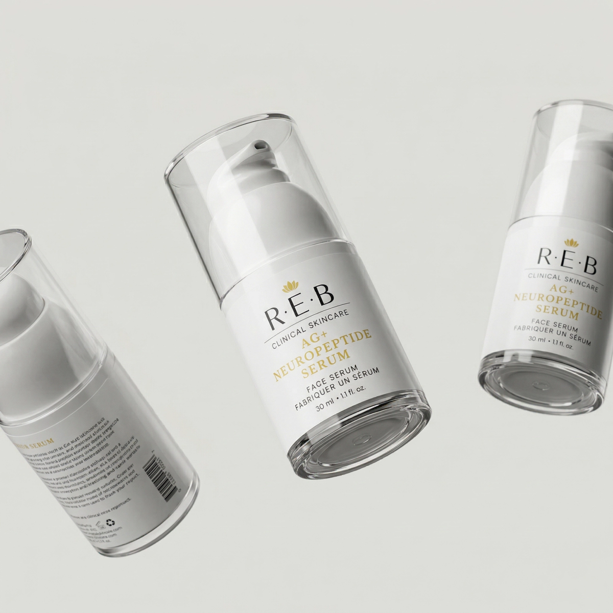 Three REB AG+ Neuropeptide Serum pump bottles showing the front label and the barcode panel