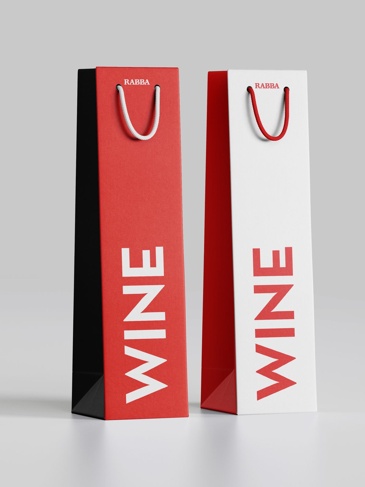 Two tall Rabba wine bags in red and white with vertical WINE type