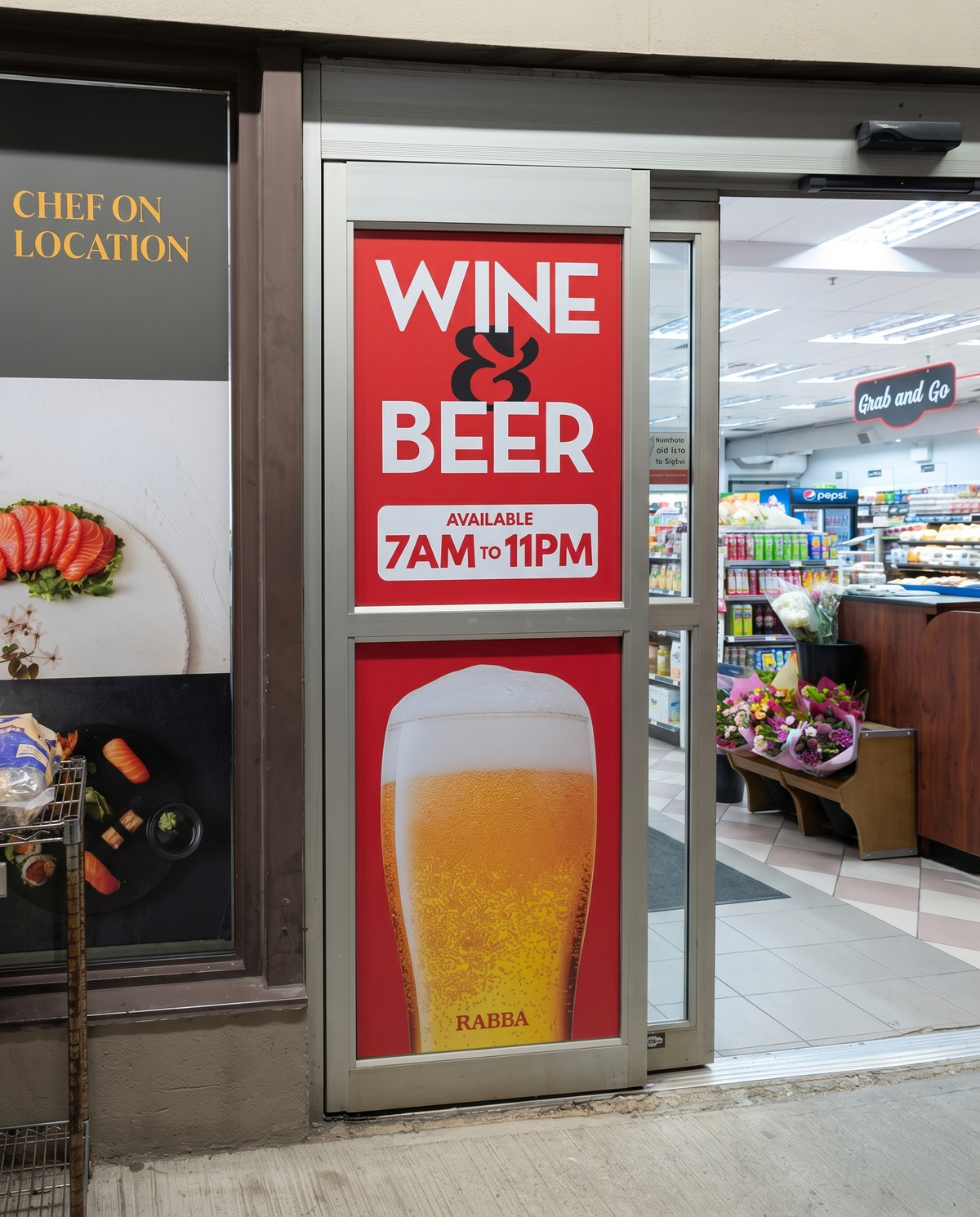 Rabba entrance door graphic repeating the Wine and Beer lockup and 7AM to 11PM hours above a glass of beer