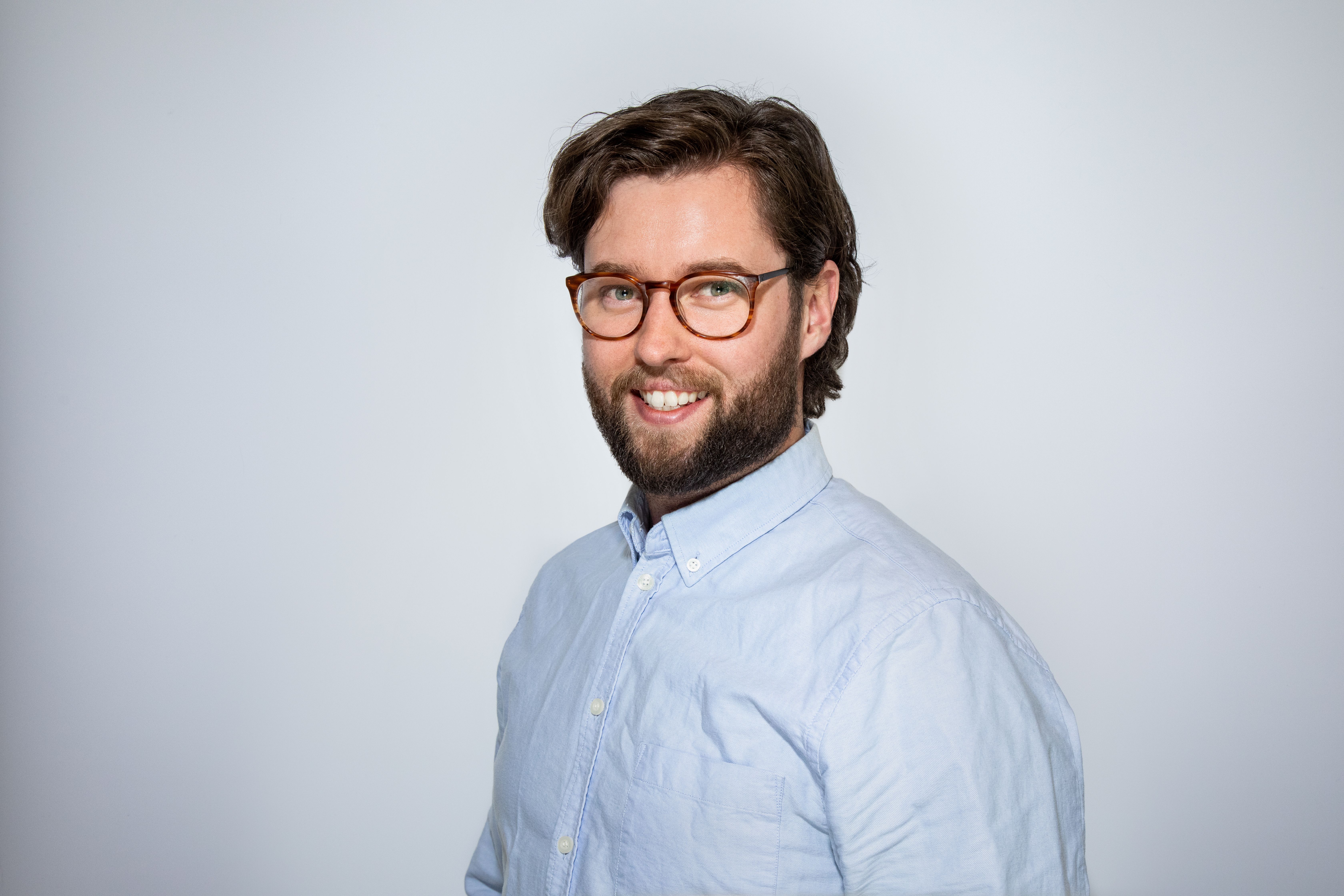 Portrettbilde av Espen By Marhaug, forlagsredaktør for jus i Gyldendal Akademisk.