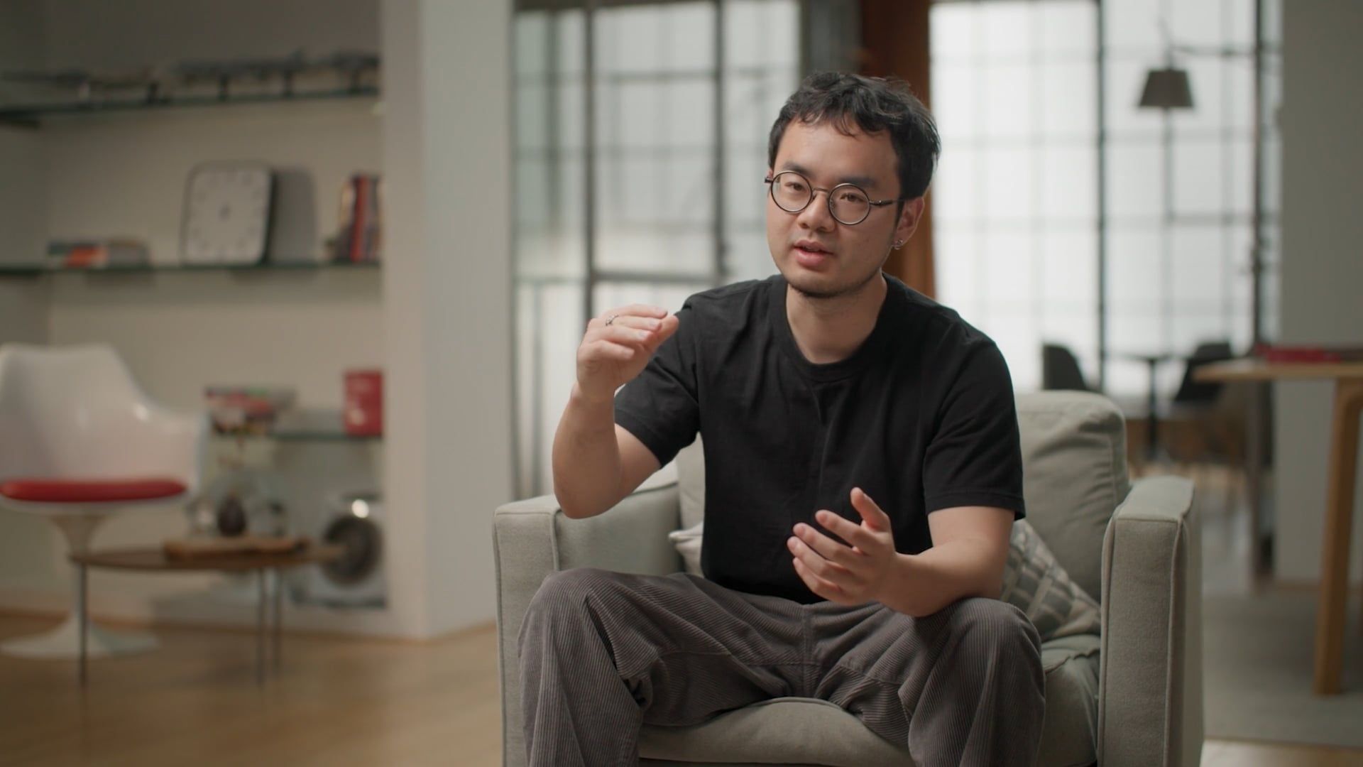 Person talking while gesturing with hands