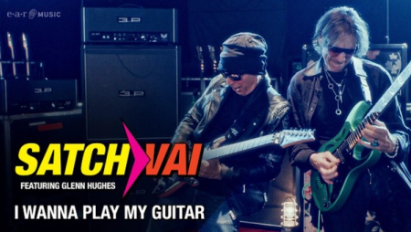 Steve Vai and Joe Satriani stand together, playing their guitars. Large text on the thumbnail says "SatchVai featuring Glenn Hughes, I Wanna Play My Guitar"
