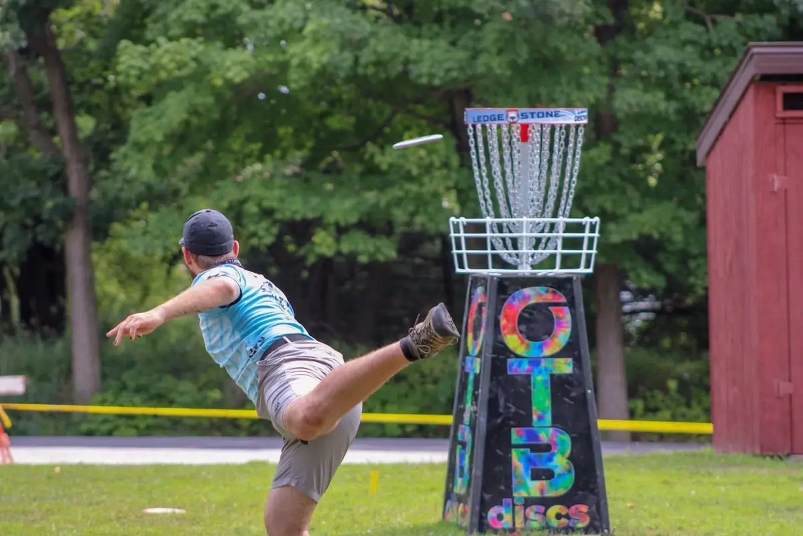 Disc golfers throwing a frisbee