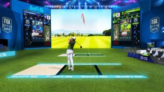 Rory McIlroy hitting driver on TGL golf arena simulator
