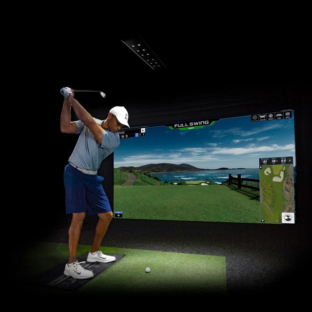 Tiger Woods on a Full Swing golf simulator